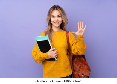 Teenager Russian Student Girl Isolated On Purple Background Counting Five With Fingers