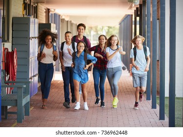 Teenager School Kids Running In High School Hallway