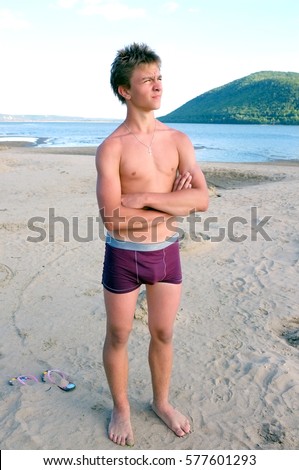Boy wearing swimming shorts — Stock Photo © Smirno #34867747