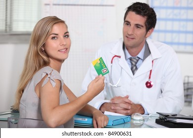 Teenager Showing French Health Insurance Card