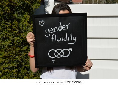 Teenager shows her support for gender fluidity and finding own non-binary identity - Powered by Shutterstock