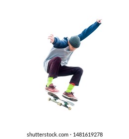 Teenager skateboarder jumps ollie on an isolated white background. The concept of street sports and urban culture - Powered by Shutterstock