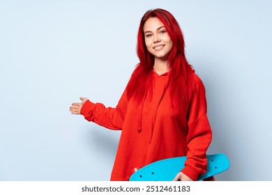 Teenager skater girl isolated on white background extending hands to the side for inviting to come - Powered by Shutterstock