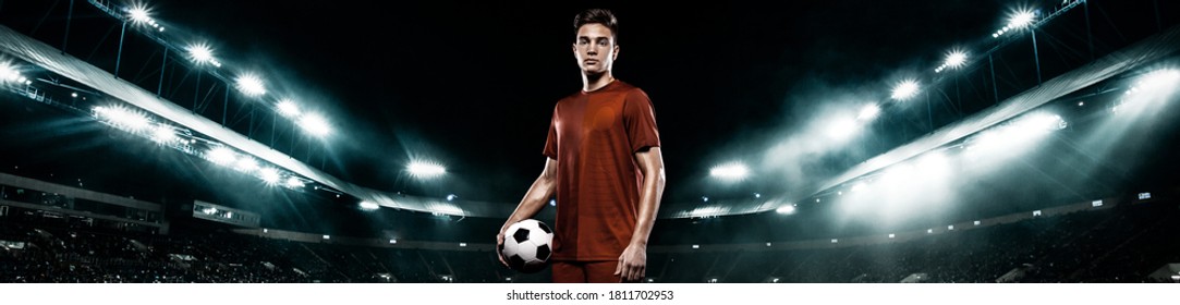 Teenager - soccer player. Man in football sportswear after game with ball. Sport concept. Wide photo.