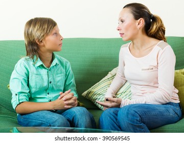 Teenager Son And  Mother Having Serious Talking 