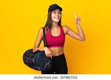 Teenager Sport Girl With Sport Bag Pointing Up A Great Idea