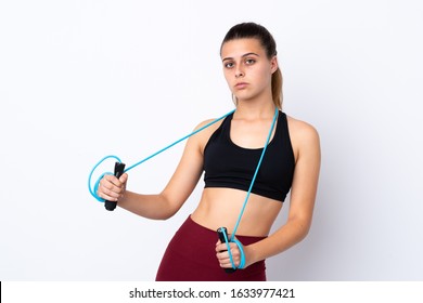 Teenager Sport Girl Over Isolated White Background With Jumping Rope