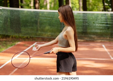 Teenager Sport Outdoor, Badminton Player Girl Going To Hit The Shuttlecock With A Racket, Serve, Badminton Competition