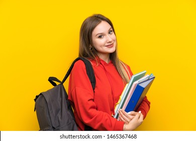 Teenager Student Girl Over Yellow Background Laughing