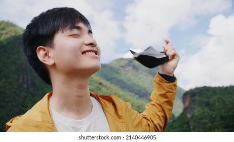 Teenager Tourist Takes Off A Mask To Breathe Fresh Air On A Mountain Peak With No Gas, Pollution.