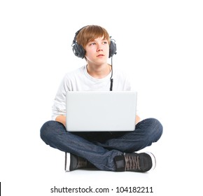 Teenager Using A Laptop. Isolated On White Background