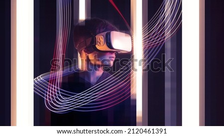 Teenager wearing a VR headset and experiencing virtual reality, metaverse and VR concept