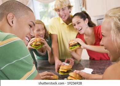 Teenagers Eating Burgers