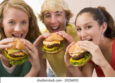 Teenagers Eating Burgers