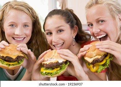 Teenagers Eating Burgers