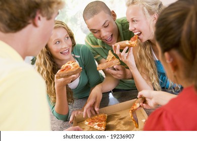 Teenagers Eating Pizza