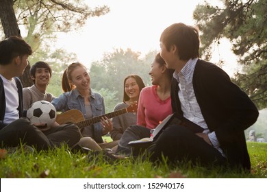 Teenagers Hanging Out In The Park