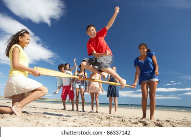 Teenagers Having Fun On Beach