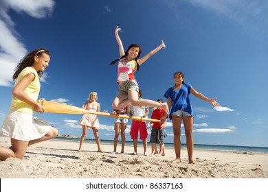 Teenagers Having Fun On Beach