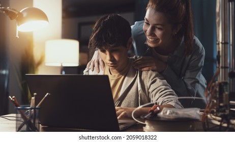 Teenagers Learning 3D Modeling And Using A 3D Printer, The Boy Is Using A Laptop And The Girl Is Helping Him