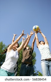 Teenagers Playing Volleyball