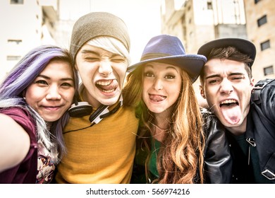 Teenagers Portrait. Group Of Teens Hugging And Making Funny Faces At Camera