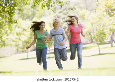 Teenagers Running Outside