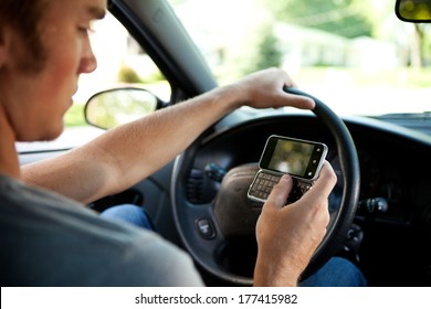 Teens: Teen Male Texting While Driving