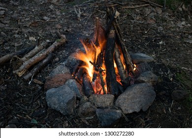 Teepee Campfire Blazing Warm And Cozy In Dark Autumn/winter Forest