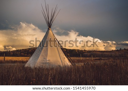 Teepee Tipi at sunset with dramatic sky