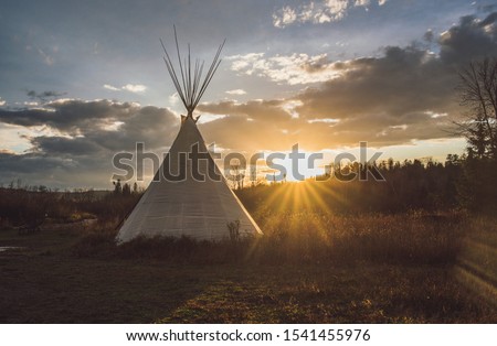 Teepee Tipi at sunset with dramatic sky