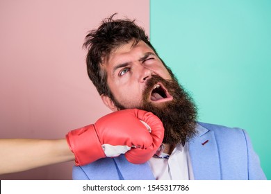 Teeth Pain Concept. Defenseless Head. Suffering. Punch In Face. Destroy Beauty. Cosmetology And Plastic Surgery Services. Strong Punch. Hand In Boxing Glove Punching Bearded Male Face. Painful Punch.