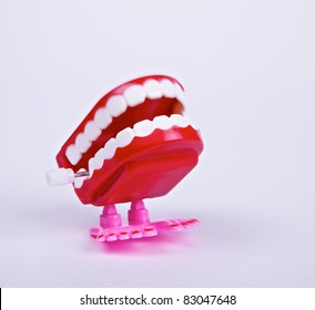 A teeth wind up toy