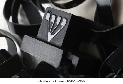 Tefillin -[Jewish phylactery] with black straps on a with blackground