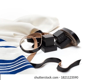 Еallith and tefillin on white background