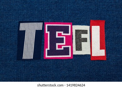 TEFL text word collage, multi colored fabric on blue denim, teach english as a foreign lanuage acronym, horizontal aspect