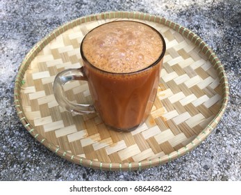 Teh Tarik Is A Hot Milk Tea Beverage Which Can Be Commonly Found In Restaurants, Outdoor Stalls And Kopi Tiams Within The Southeast Asian Countries Of Malaysia And Singapore.