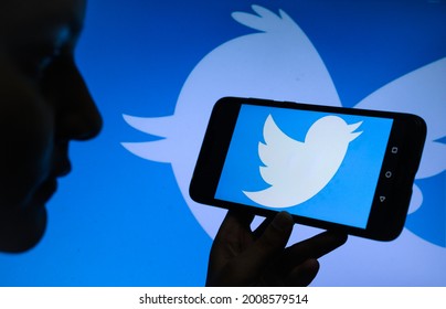 Tehatta, India – July 7, 2021: In This Photo Illustration Shows Twitter Inc. No More Enjoys Liability Protection Against User-generated Content In India. A Girl With Tweeter Logo Phone. 