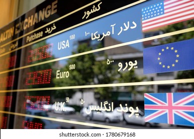 Tehran / Iran - Jul 21 2020: Exchange board shows the currency of Iranian Rial against, American dollar USD, European EUR, and English GBP. It also depicts low buying power and a high inflation rate. - Shutterstock ID 1780679168