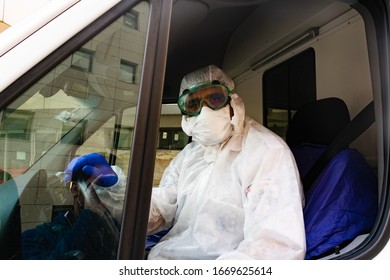 Tehran, Iran, March 2020: An Ambulance Driver Is Transporting Coronavirus Patients To The Hospitals.