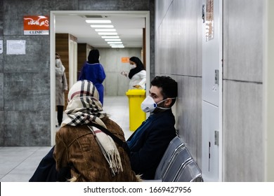 Tehran, Iran, March 4 2020: A Young Man And His Wife Are Waiting For Coronavirus Test In A Hospital.