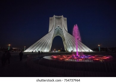 Tehran, Iran-CIRCA October 2017. A Dramatic Color Nightscape View Of The Azadi Tower, Located At Azadi Square. It Is A Symbol For 2,500th Year Of The Foundation Of The Imperial State Of Iran.