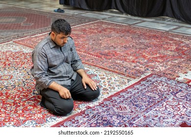 Tehran, Tajrish Iran - Aug 21 2022: A Muslim Man Praying In A Mosque