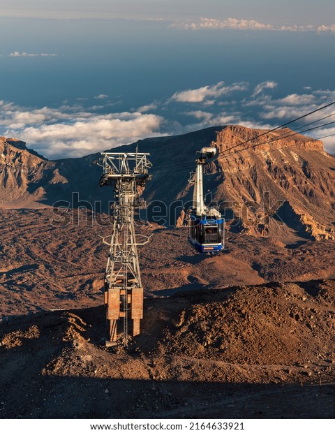 Teide National Park,\
Tenerife, Spain - 17.9.2021: Cable car riding to the peak of Mount\
Teide called \'Pico del Teide\'. View of the caldera, volcanic\
landscape. Canary\
islands.