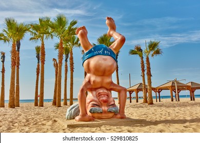 Tel Aviv - 28 November, 2016: Statue on Tel-Aviv beach - David Ben-Gurion practices yoga asana