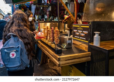 TEL AVIV, ISR - January 25, 2022: Israelis Shop At The Carmel Market Shuk HaCarmel In Tel Aviv, Israel. This Is A Very Popular Market In Tel Aviv And Sells Mainly Food.