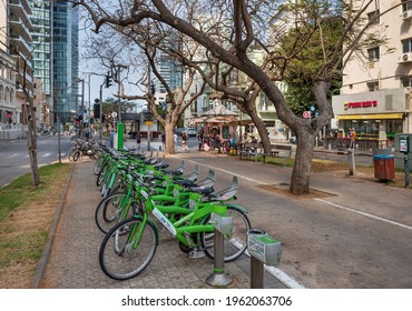 TEL AVIV, ISRAEL - APRIL 24, 2021 : City bicycles at  boulevard Rothschild - the most prestigious area in Tel Aviv, Israel.
