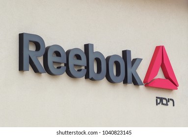 TEL AVIV, ISRAEL - FEBRUARY 08, 2018. Reebok logo at the entrance in Reebok store. Reebok is a global athletic footwear and apparel company, operating as a subsidiary of Adidas since 2005. 
