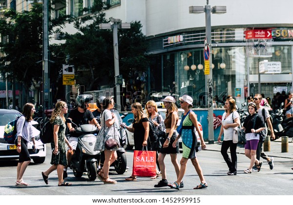Tel Aviv Israel July\
16, 2019 View of unknown people walking in the streets of Tel Aviv\
in the afternoon