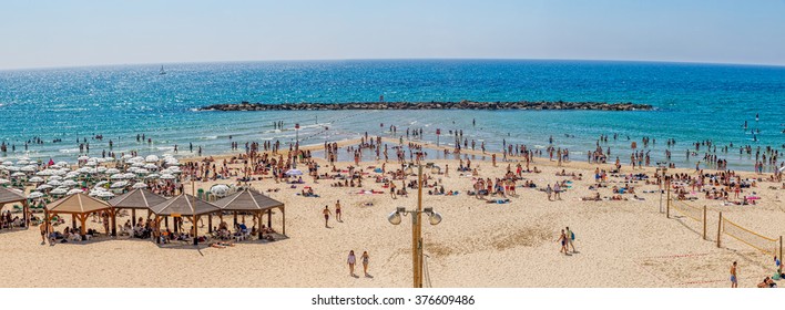 TEL AVIV, ISRAEL - JUNE 18, 2015: People enjoying the beach life at late spring time.
